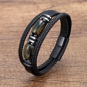 Detail of tiger eye beads and braided black leather multi-layer bracelet with magnetic clasp
