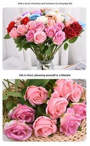 Detailed view of artificial roses with layered silk petals and realistic green leaves