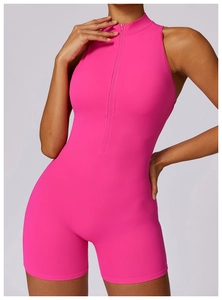 Detail of high-stretch hot pink yoga bodysuit with zipper neck and slim fit design