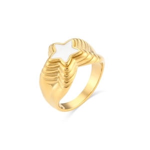 Detail of 18K gold-plated stainless steel ring featuring a white enamel star centerpiece