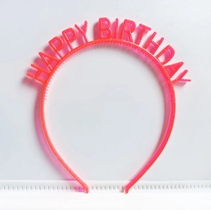 Detail of pink glitter Happy Birthday headband made of durable plastic on white background