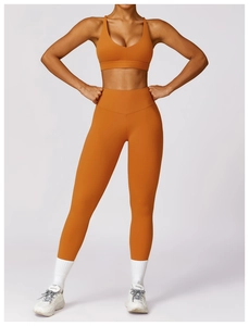Front view of high waist caramel yoga leggings and V-neck sports bra set for women