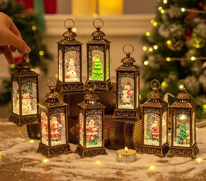 Close-up of lighted bronze Christmas lanterns with Santa and snowman on snowy props