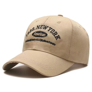 Classic khaki cotton baseball cap with New York 1989 embroidery from a 45-degree angle