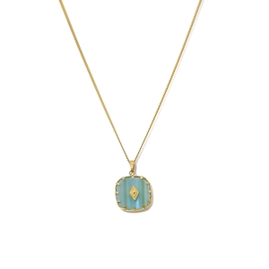 Vintage gold hollow carved necklace with a geometric light blue natural stone pendant