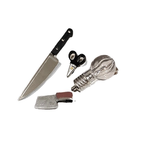 Creative mini knife and light bulb hair clips with silver metallic finish on white background