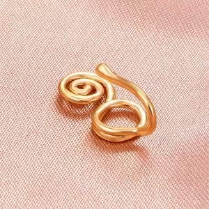 Golden spiral U-shaped non-piercing nose clip with high-polish metallic finish on satin