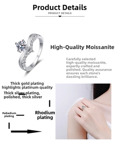Close-up of S-shaped silver V-ring featuring a brilliant moissanite and pavé accents