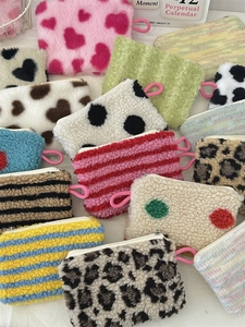 Plush heart and animal print mini cosmetic bags with zippers in multiple colors