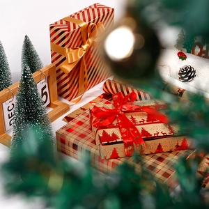 Christmas gold foil waterproof kraft paper gift boxes with festive ribbons and deer patterns