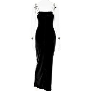 Back view of a sleek black maxi dress with slim rhinestone straps and backless design