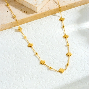 Minimalist gold stainless steel chain necklace featuring small beads and star pendants