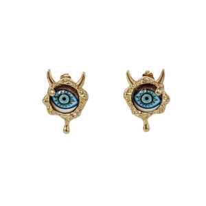 Ethnic style gold devil eye stud earrings with blue pupil and small horns design