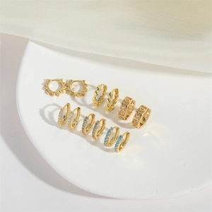 5 pairs of gold hoop earrings set featuring sunflower, heart, and zircon charms