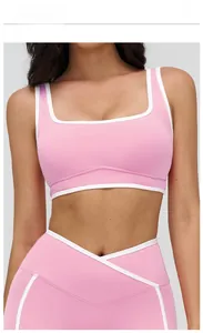 Detail of square neck yoga bra and V-waist leggings in cherry blossom pink set