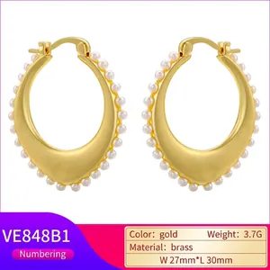 French vintage brass C-shape hoop earrings with small white pearls in gold finish