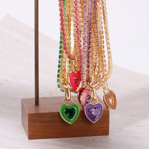Chic gold-plated tennis necklace featuring colorful heart pendants and emerald zircon stones