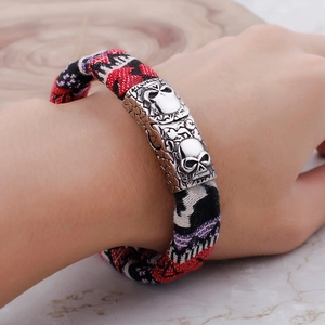 Men's gothic woven canvas bracelet with silver skull charms in red and black