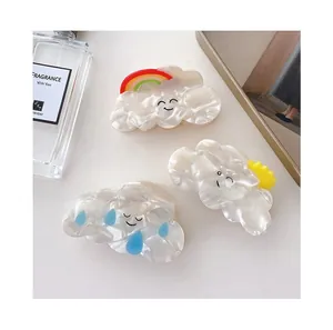 Three-piece set of cartoon cloud hair claws with rainbow, sun and raindrop motifs