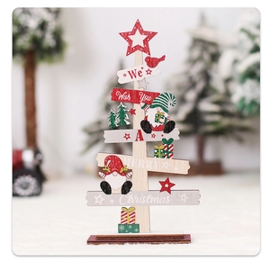 Detail of wooden Christmas tree stand with cartoon faceless dolls and festive ornaments