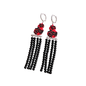 Traditional red gourd tassel earrings with silver hooks and black beaded fringe charms