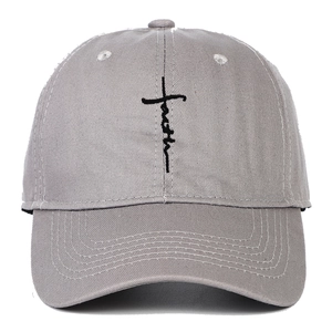 Grey cotton baseball cap with black faith cross embroidery on a plain white background