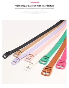 Detailed view of women's thin PU leather belts in eight vibrant candy colors with pin buckles