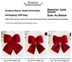 Macro shot of three sizes of burgundy velvet Christmas bows showing fabric texture