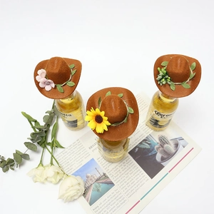 Mini brown felt cowboy hats with floral accents for festive party wine bottle decoration
