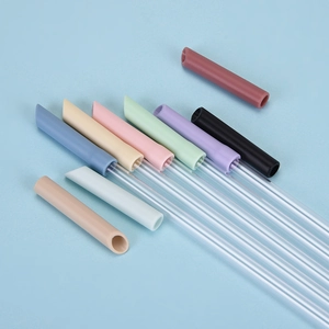Reusable Tritan telescopic straws with colorful silicone tips for milk tea on blue background