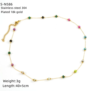 Detail of 18k gold plated stainless steel chain with colorful square beads