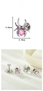 Macro shot of a titanium spider lip stud with pink opal stone and detailed size dimensions