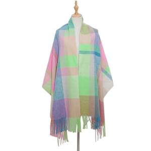 Close-up of pastel plaid scarf texture featuring soft tassels and multi-color check pattern