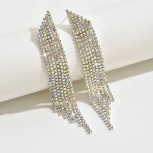 Detail of silver waterfall drop earrings with shimmering iridescent AB rhinestones