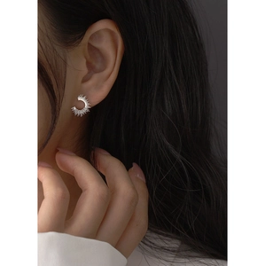 Chic S925 silver C-shape stud earrings with micro-set zircon on model for women