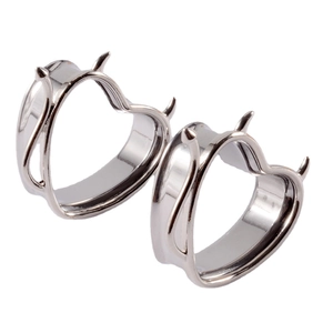 Polished silver heart-shaped devil horn stainless steel ear tunnels on white background