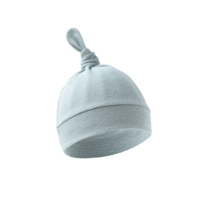 Detail shot of newborn baby knot hat in soft mint blue cotton knit fabric