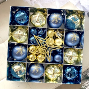Blue and gold Christmas tree ornament set with stars and snowflake patterned balls