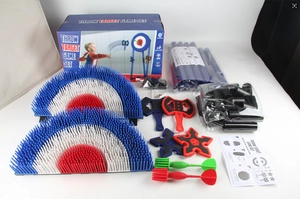 Detailed kit view of kids throw target game set with axes, darts, and stand components