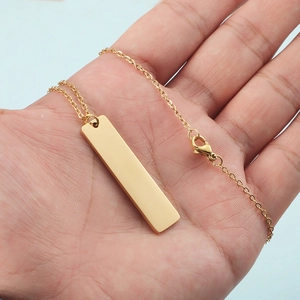 Polished gold bar pendant necklace in minimalist stainless steel for men and women