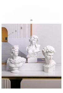 Close-up of white resin Greek sculptures used as artistic home decor and studio props