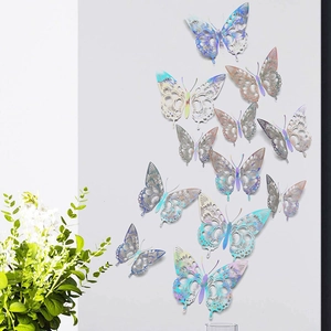 3D hollow butterflies wall stickers with holographic gloss finish on a grey background