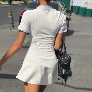 Back view of a white short-sleeve shirt dress with blue striped collar and cuff details