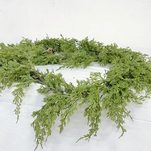 Green cypress leaf garland with natural pine cones for Christmas staircase home decoration
