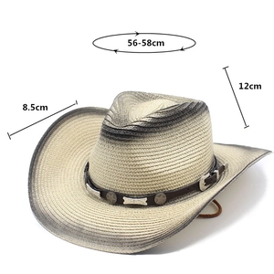 Detail of woven straw cowboy hat with brown leather band and metal star studs