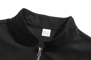 Close-up of stand collar zipper and size tag for slim-fit casual jacket
