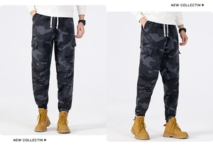 Macro view of grey camouflage cargo pants featuring elastic drawstring waist and side pockets