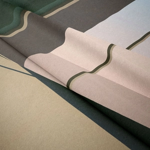 Close-up of bohemian wall tapestry showing soft velvet texture and abstract wavy patterns