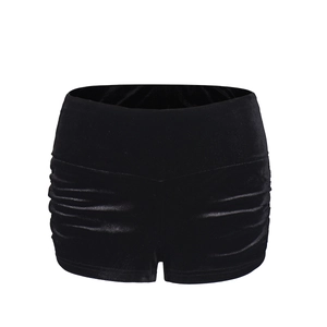 Detail of high-waist black velvet shorts featuring side ruched elastic waistband design