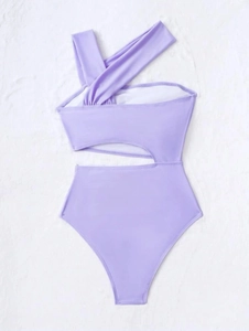Detail of lavender one-piece swimsuit featuring waist cut-out and cross neckline design